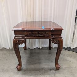 Traditional Dark Wood End Table with Carved Details