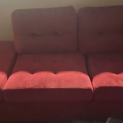Red sectional with an ottoman 3 piece set