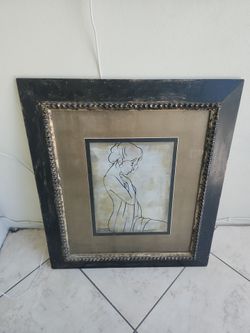 28 in wide by 30 in tall wood framed with glass wall art $3.00