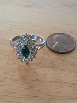 Emerald green and other vintage costume jewelry