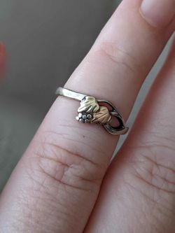 silver ring with  10k gold size 7