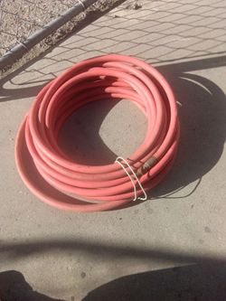 Red Rubber Air Hose Coiled