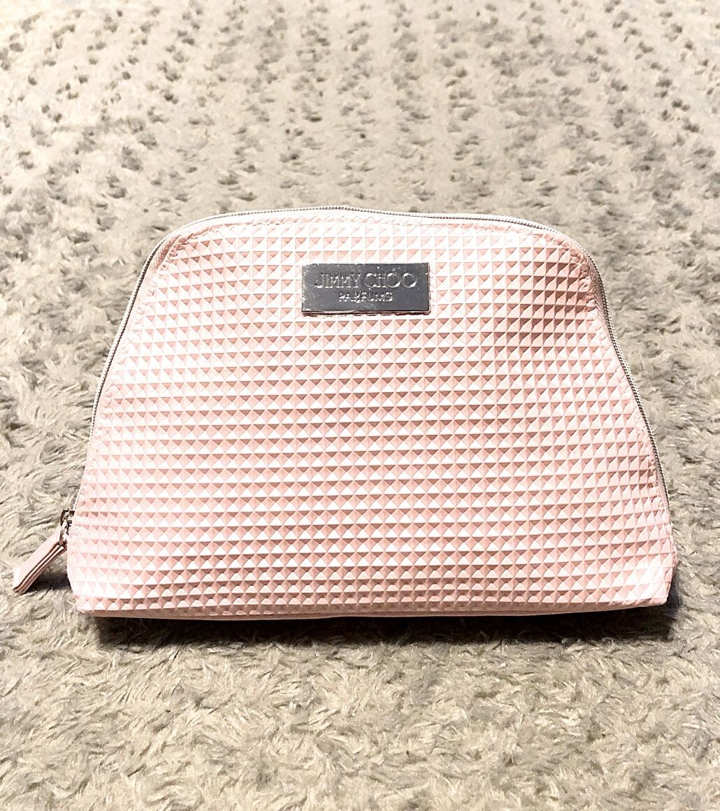 New! Jimmy Choo Parfums Cosmetic bag. Brand new never used. Super cute 3D pink makeup Clutch/Bag.