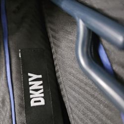 Mens dkny navy blue suit. Worn one time. Smoke free house. Jacket 40R and pants 32W x 30L.