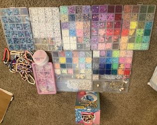 Assorted beads, string and bead tumbler.