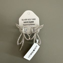 Women’s silver bow knot shape earrings