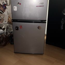 black and grey mini fridge 