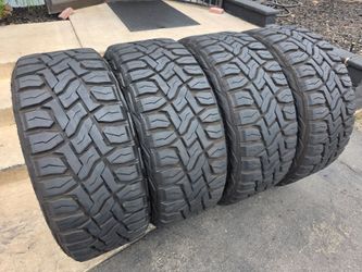 37" Toyo RT tires. 37x13.50R24