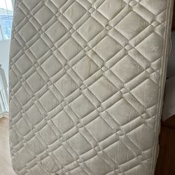 Full size mattress which was left behind by tenants