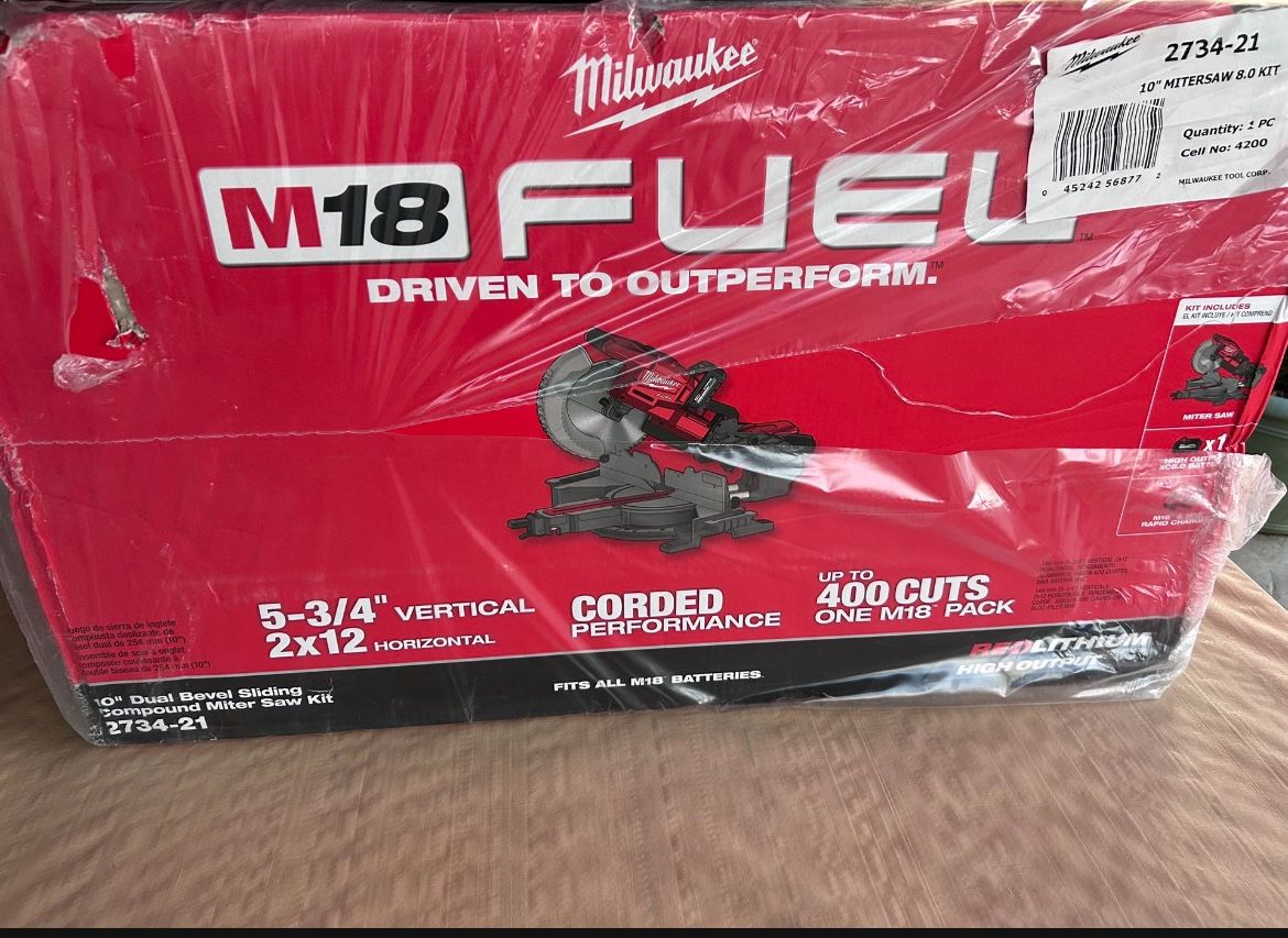 Milwaukee miter saw with charger and battery
