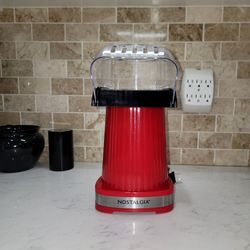 NOSTALGIA brand electric hot-air POPCORN Maker. Prepares up to 16 cups of POPCORN per batch.