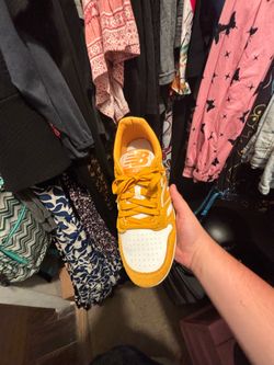 Yellow and white new balances
