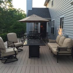 Fire Table, Sofa, And Swivel Chairs