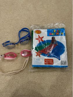 New green raft & 2 pairs of googles