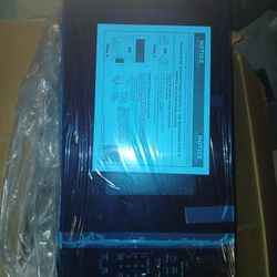 GE Profile™ 2.2 Cu. Ft. Black Built In Microwave