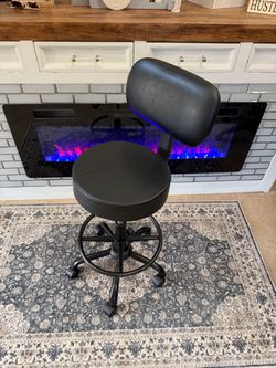 Black round drafting stool with footring