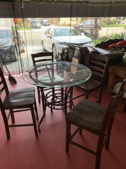 Glass dining table and 4 barstool chairs