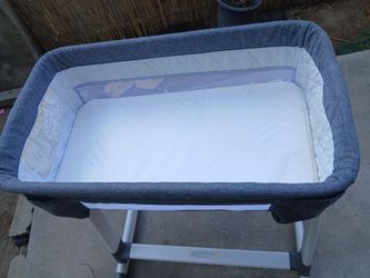 Gray baby bassinet
