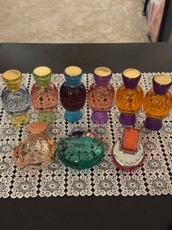 Collection of 9 Bvlgari Perfume Bottles