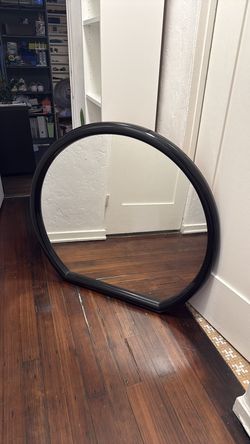 Funky oval mirror black frame round