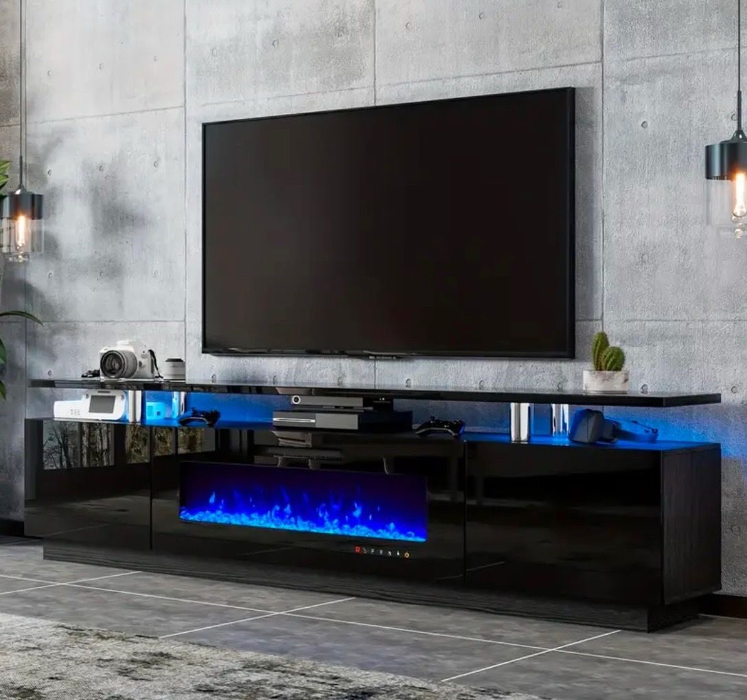 Brand new black led tv stand with fireplace 80 inches length fits up to 98 inch tv ( led changing color lights )