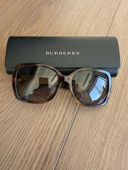 Burberry Sunglasses (new with case) Brown Color
