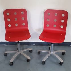 Pair of Red Swivel Chairs