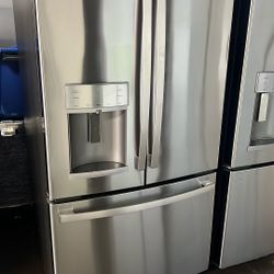 NEW GE FRENCH STYLE STAINLESS STEEL REFRIGERATOR 