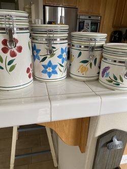 For Verona, ceramic flower canisters