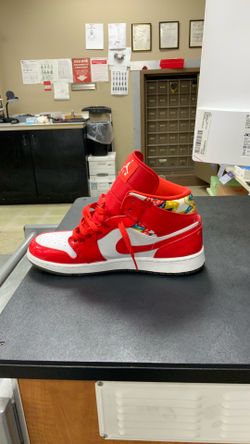 Red and white Nike