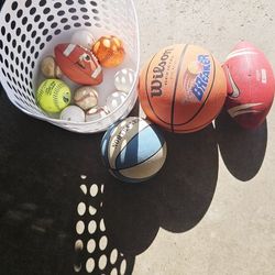 Various Baseballs And Football,  Basketball