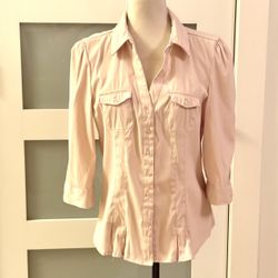 Cotton Express button-up blouse in a pale pink or "blush" tone, characterized by its three-quarter sleeves and double pockets
