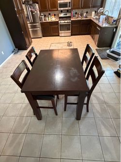 High top table and chairs