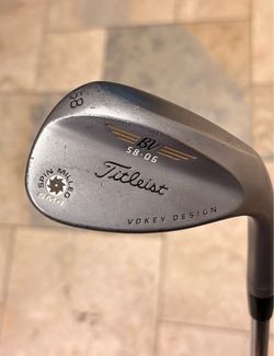 Titleist Vokey 58* wedge———————