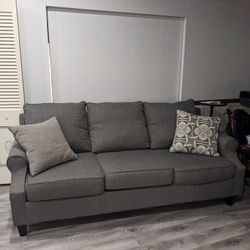 Gray Sofa with Pillows 