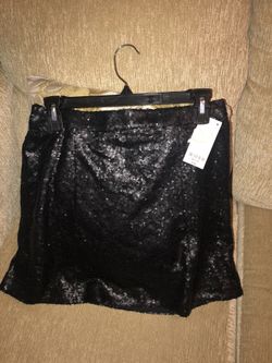Ladies size medium dressy short black skirt $25 or best offer