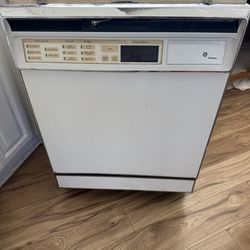 White GE monogram dishwasher working