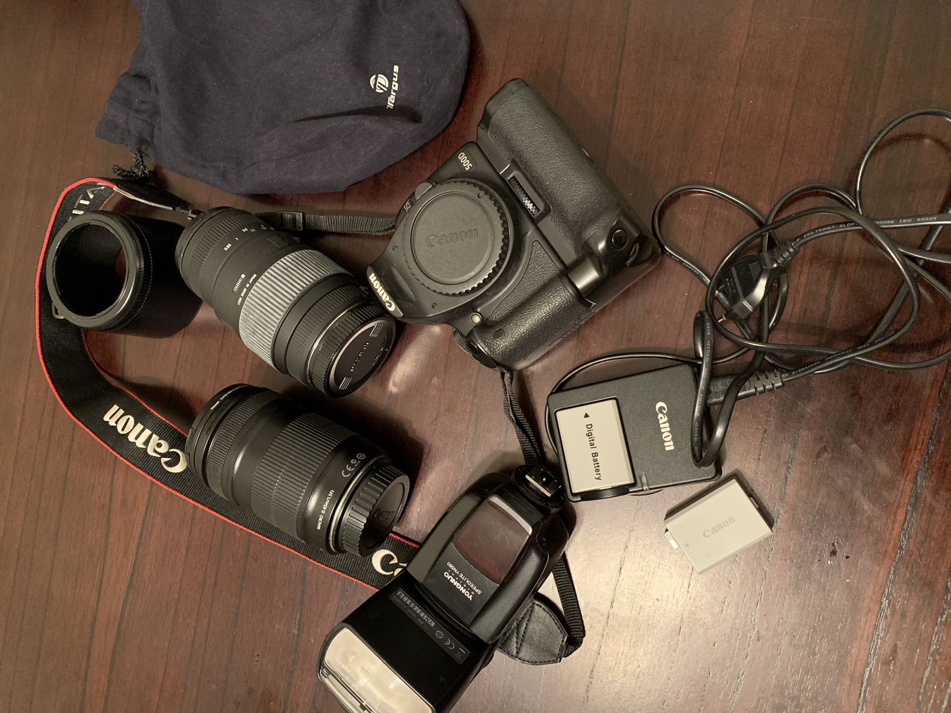 Canon EOS 500D with 2 Lens, camera extender, battery charger and everything.