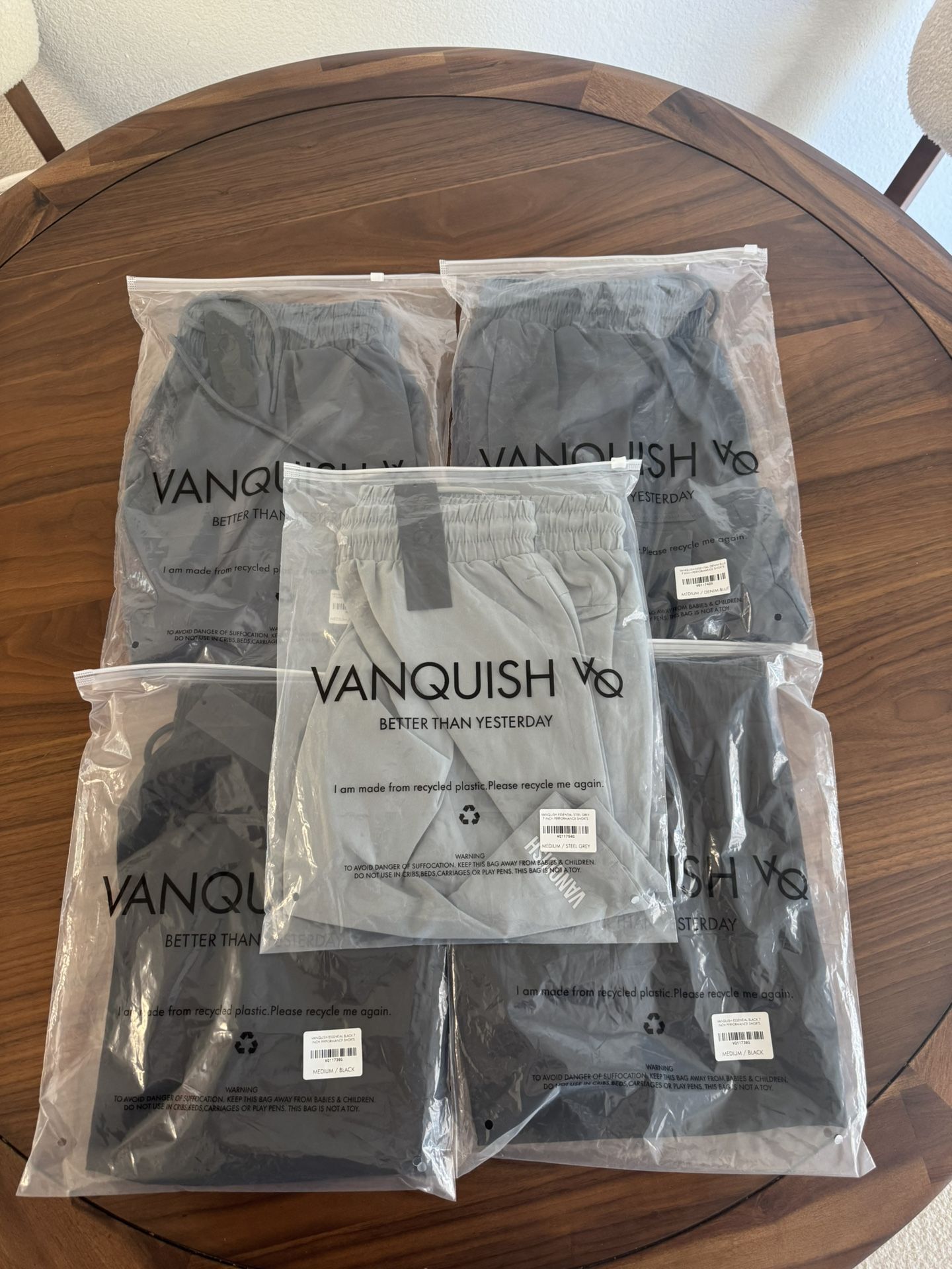 VANQUISH ESSENTIAL 7" PERFORMANCE SHORTS - 5 PAIRS (2) BLACK, (2) DENIM BLUE, 1 STEEL GREY, SIZE M, $25 EACH