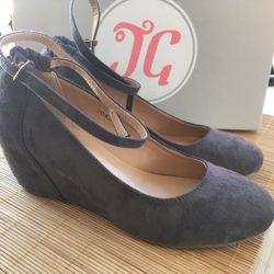Faux suede strappy wedge.
