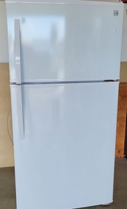 White Kenmore Top Freezer Refrigerator. Used, in good working condition. Refrigerator is plugged in, clean and ready to use. 

33"W x 30"D x 66"H 

$2