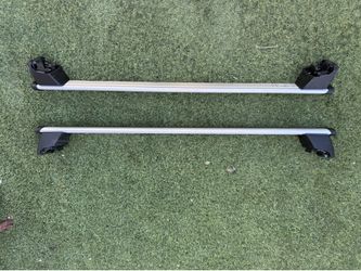roof rack system (crossbars) or a hitch-mounted rack.