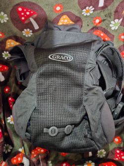 Graco Cradle Me 4-in-1 Baby Carrier. Color charcoal grey