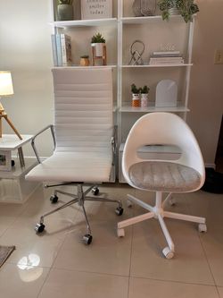 Two White Office Chairs on Wheels