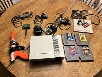 Vintage nintendo entertainment system with the controllers and power cords, Nintendo NES Advantage Joystick Controller, with 4 games, Super Mario Bros