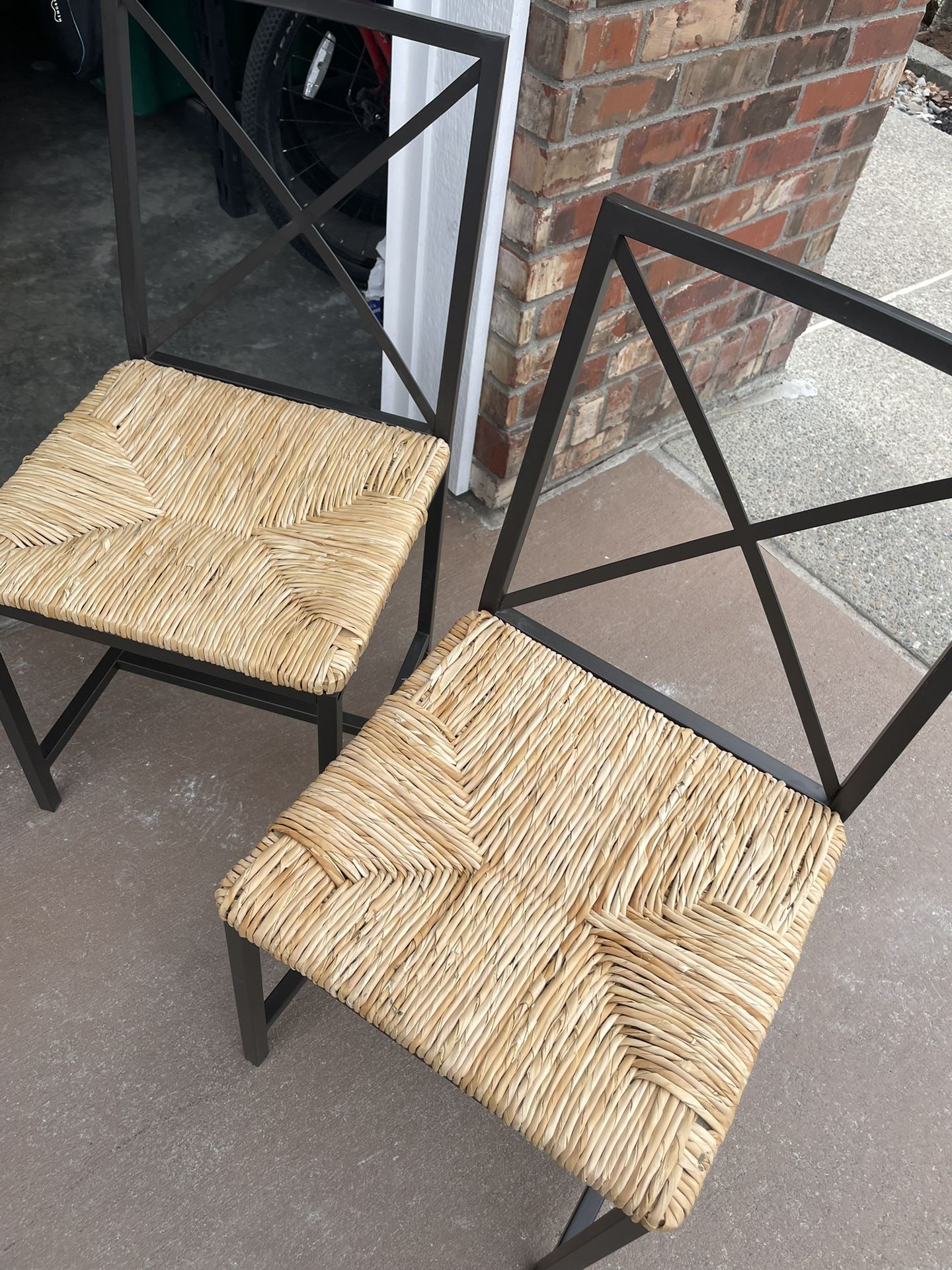 Pair Of Black Metal Crossback Chairs With Wicker Seats