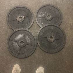 4  45 Lb York Barbell Plates