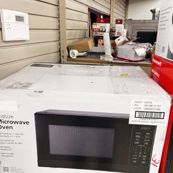 1.1 Cu. ft Microwave Oven in Black, New