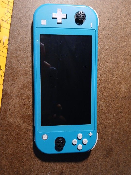 Nintendo Switch Lite In Fairly New Condition