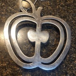 metal silver apple trivet 